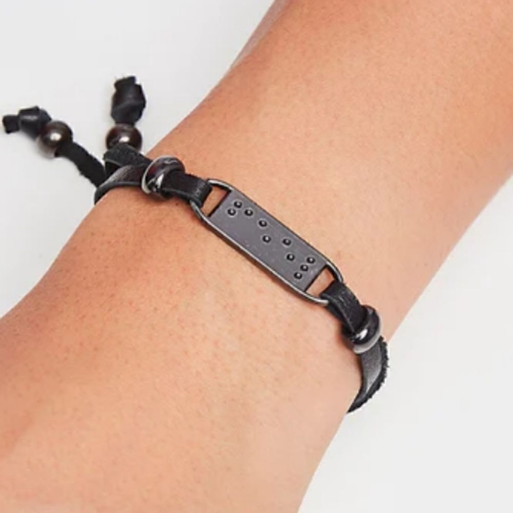 NWT 2 Blind Brothers Feel bracelet. Has the word FEEL in braille.